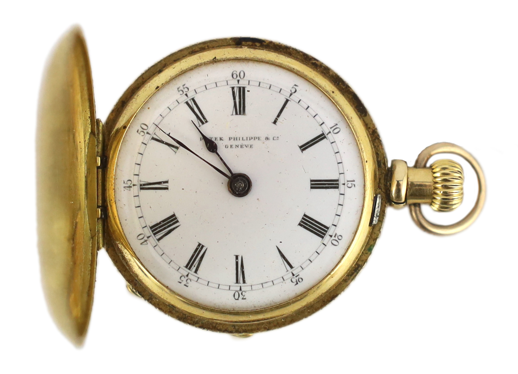 An early 20th century engraved 18ct gold and pink guilloche enamel Patek Philippe keyless fob watch